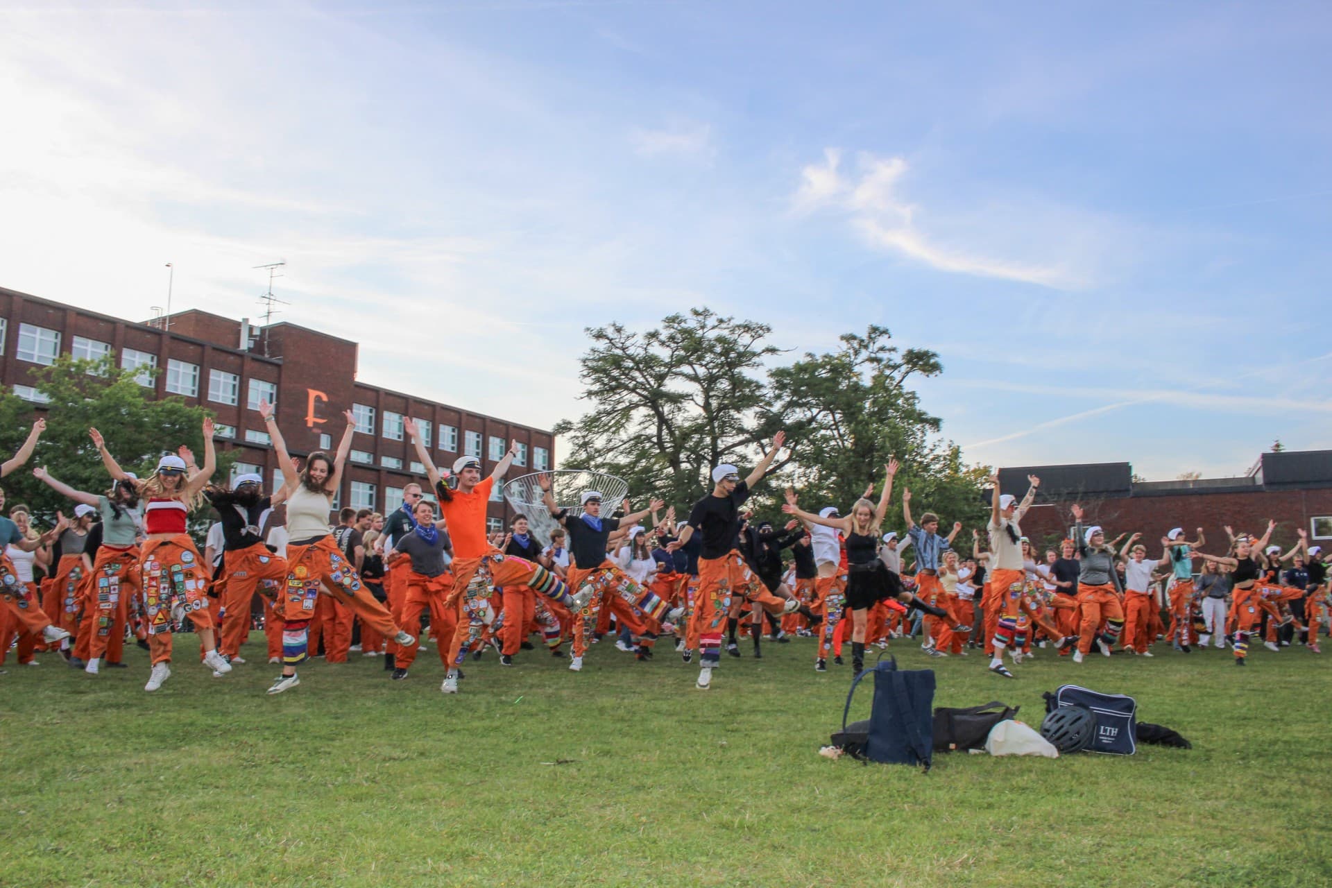 People dancing outside at a nollning event