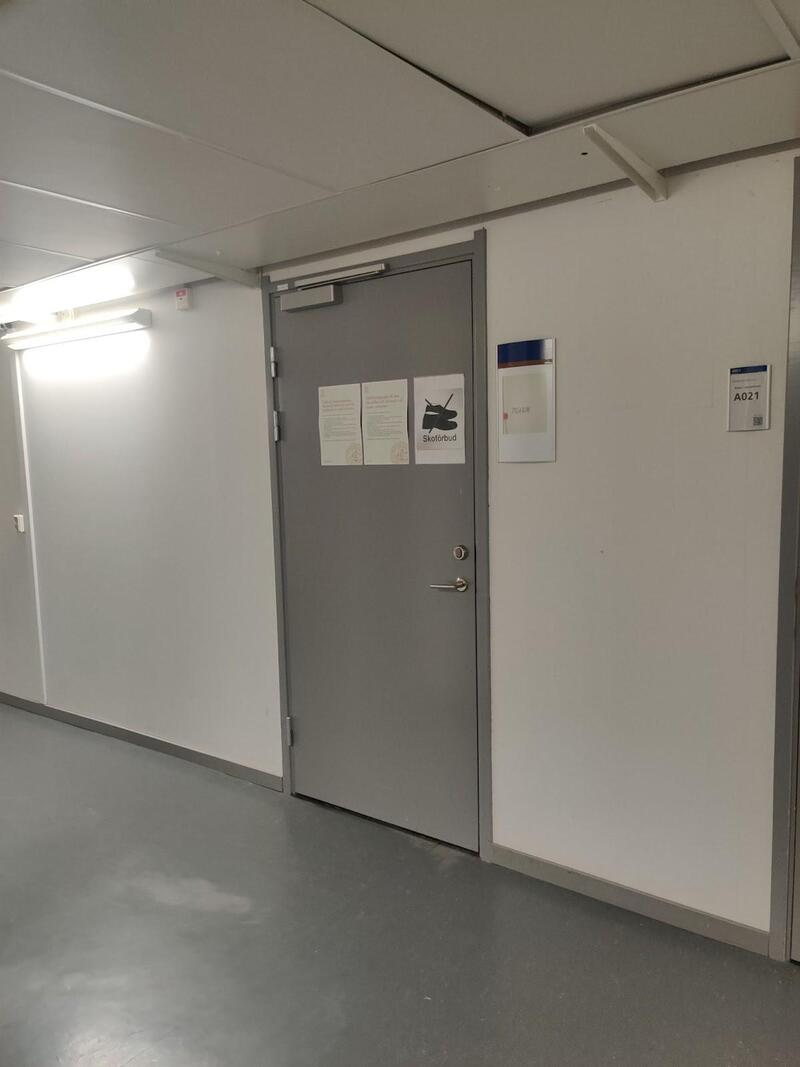An image of the door to the room.