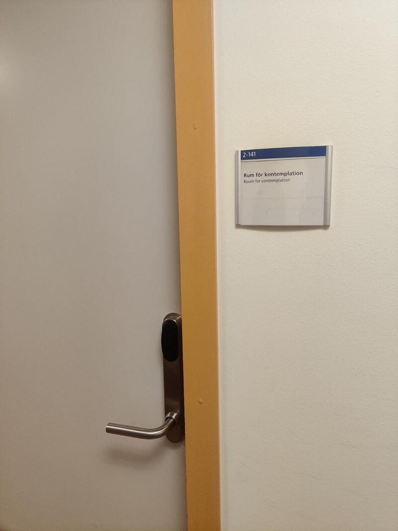 An image of the door to the room. Room 2-141.